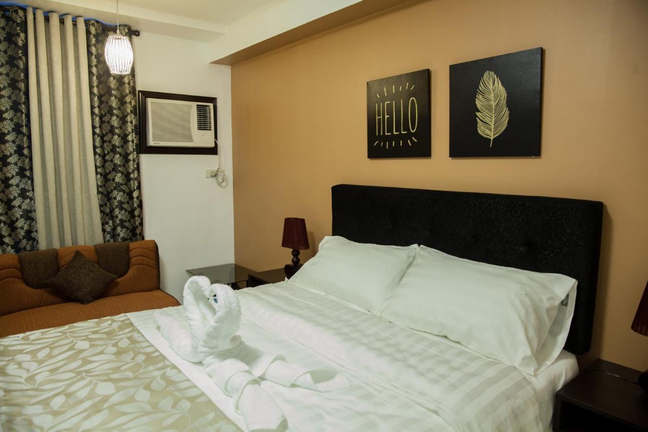 Melbourne Suites Makati City Bagian luar foto